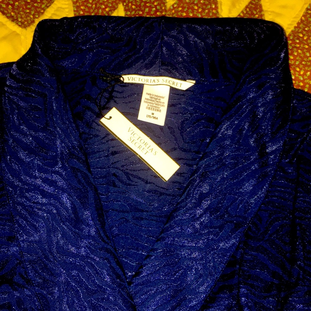 Authentic  beautiful VS overall .Silky material soft touch very nice materials.